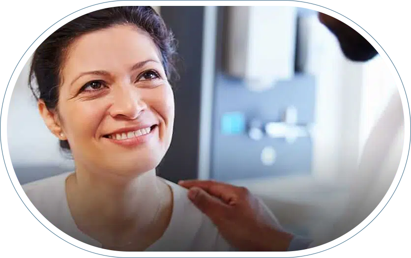 Woman getting consoled by her back specialist.