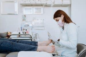 Podiatrist providing foot care