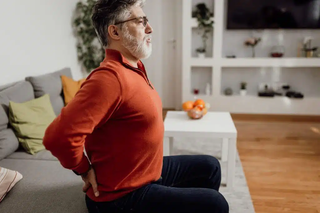 picture of a man suffering with lower back pain