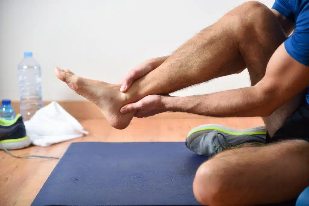 Image of man doing sports with foot and ankle pain.